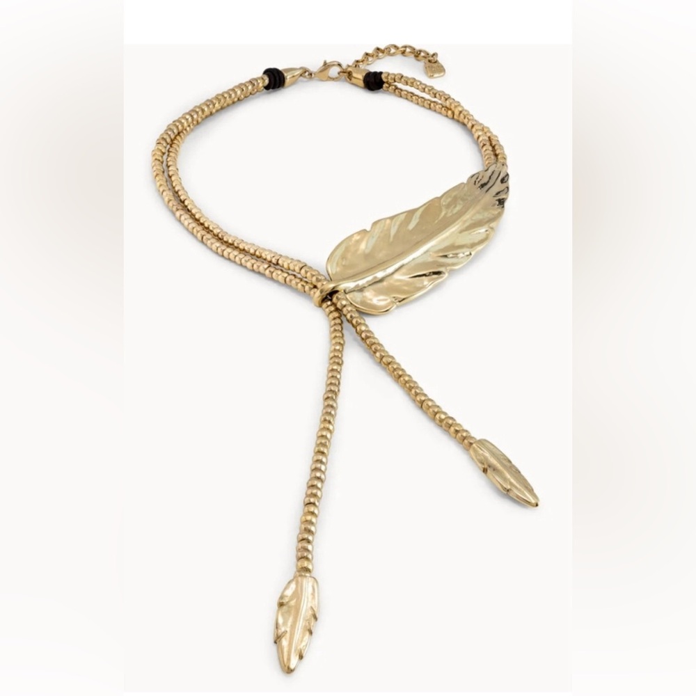 Necklace , UNO DE 50 , gold tone , never worn .